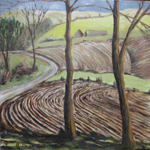 Winter landscape marked by the farmer's toil, roads meandering around undulating hills.